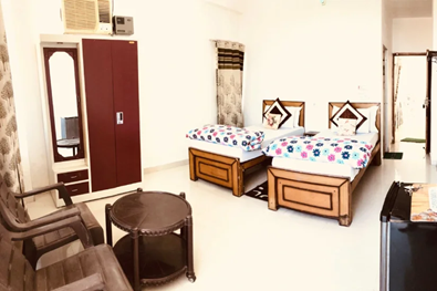 Twin shared accommodation at Samatva Yogalaya yoga retreat in Rishikesh